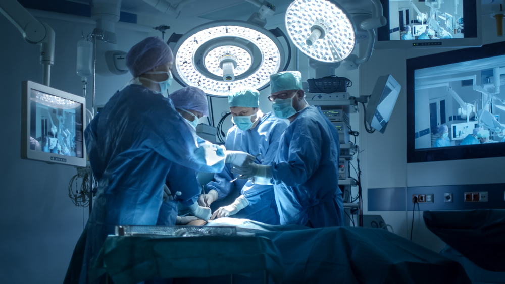 Medical,Team,Performing,Surgical,Operation,In,Modern,Operating,Room