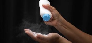 Talcum Powder Poured into One's Hand